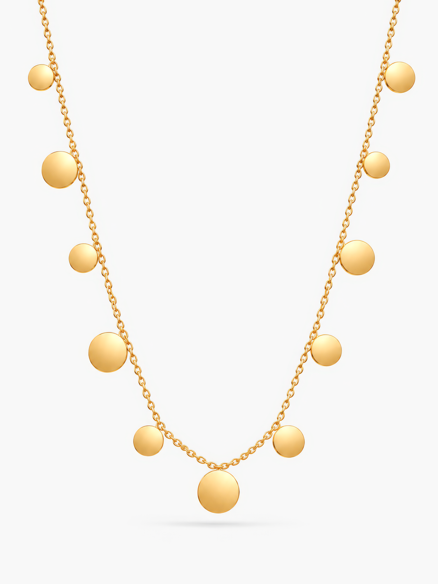 Goldene Lyra Plättchenkette von Mercy’s Jewelry mit runden Plättchen vor hellgrauem Hintergrund.